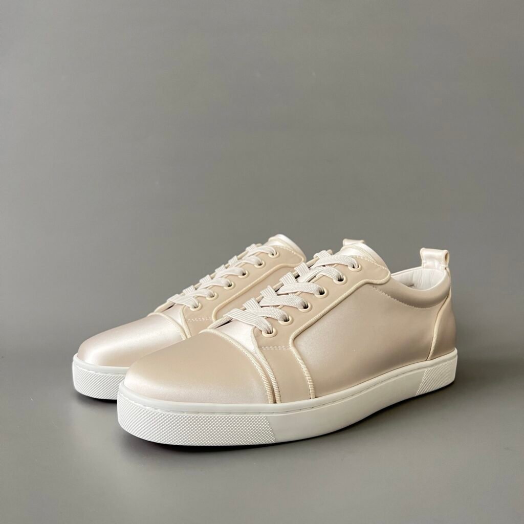 AuroraCustom Christian Louboutin Louis Junior 'Champagne Glow' Calfskin CL Louis Junior Series Champagne Gold Satin Luminous Sneakers