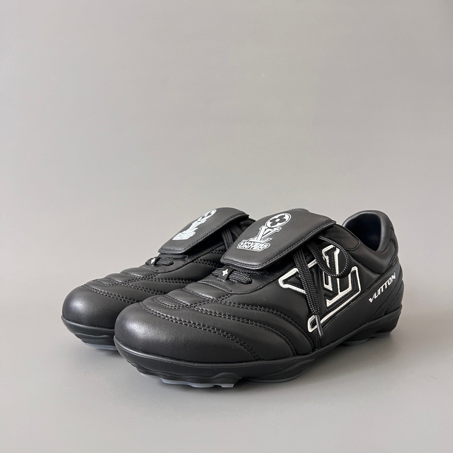 AuroraCustom LV Footprint Soccer Series Obsidian Core Black Premium Leather Fold-Over Tongue Avant-Garde Luxury Statement Sneaker (Unisex Edition)