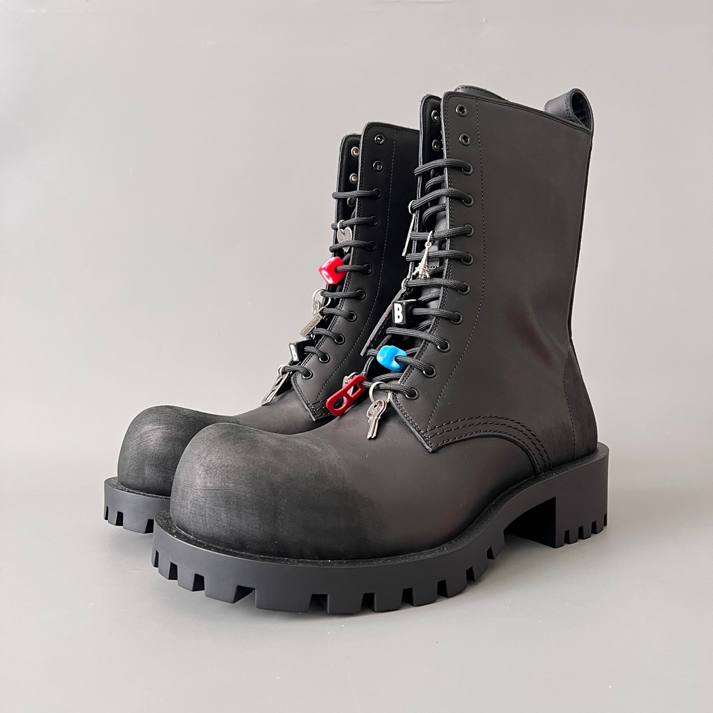 AuroraCustom Balenciaga Strike Series Charm-Adorned Heavily Distressed Matte Calfskin Combat Boots (Men's Edition)